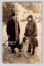 Vintage Postcard RPPC Middle Aged Couple Winter Scene Clothing Large Dog picture