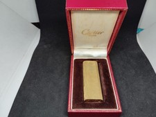 Vintage Cartier gas lighter Gold with an all-over pattern oval with box. picture
