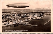 1938 Hindenburg Zeppelin over Friedrichshafen Vintage Postcard 4P23-21 picture