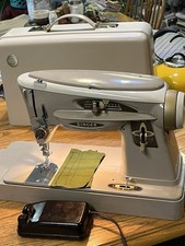 Singer  503A Slant Needle ROCKETEER Sewing Machine with Case And User Manual picture