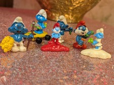 collection of vintage PVC Smurf figurines produced by Schleich picture