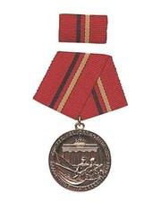 Authentic New East German Army Bronze Combat Medal w/ Ribbon picture