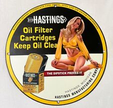 HASTINGS OIL FILTERS CARTRIDGES PORCELAIN PINUP BABE MANCAVE GARAGE GAS OIL SIGN picture