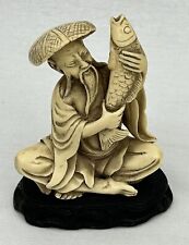 Vintage Chinese Asian Oriental Man With Fish Carved Resin Figurine picture