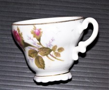 ANTIQUE PORCELAIN HANDPAINTED TEA CUP AND SAUCER picture