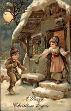 Christmas Children in Snowy Cottage Scene P F c1900s-10s Vintage Postcard picture