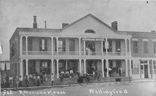 F62/ Wellington Ohio RPPC Postcard c1910 American House Hotel Building picture