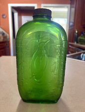 Green Glass Water Bottle w/ Embossed Penguin Owens-Illinois Glass Co 1930’s picture