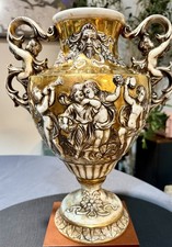 Large and rare N Capodimonte Gold Luster Large Urn.  Lovers everywhere. Pristine picture
