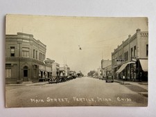VTG Old Post Card Fertile, Minnesota - REAL PHOTO Bank, Drug Store, Main Street picture