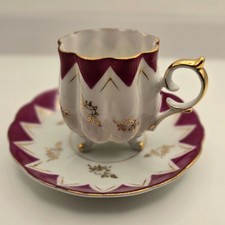 Vintage Porcelain Handpainted cup ans saucer with gold accents picture