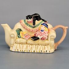Delton Tea Time Hand Glazed & Painted Porcelain Teapot, Cat & Doll on Sofa picture