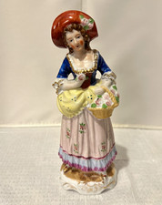 Vintage - Figurine - Japan - Colonial lady holding a basket - colorful dress picture