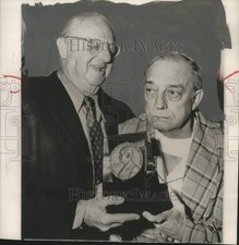 1955 Press Photo Comedian Buster Keaton receives a