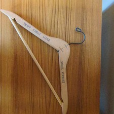 Trapp Family Lodge Beige Wooden Clothes Hanger Stowe VT Hotel & Motel Ad picture