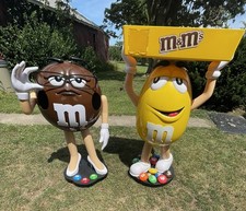 Collectable M&M's Character Candy Displays Brown & Yellow On Wheels Lot Of 2 picture