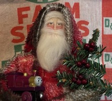 Handmade Primitive Santa Doll Holding A Train picture