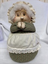 vintage soft-sculpture grandma doll featuring a green floral outfit picture