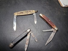 3 Vintage Old timer, Cavalier & gold embossed wildlife scene pocket knife lot. picture