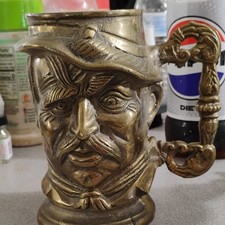 These Are Both Solid Brass. The Cup Is Theodore Rosevelt. Both Very Old. picture