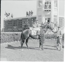 Jockey Dave Erb groom Joe Rutter share winners circle Needles aft- 1956 Photo picture