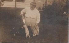 RPPC Postcard Woman Bottle Feeding Baby Pigs Piglets Foxburg PA  picture