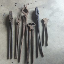 lot of vintage blacksmith tools picture