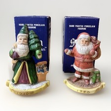 Santa Through The Years  Set of 2 Porcelain Figurines Christmas With Boxes 4”H picture
