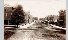 MAIN STREET stockton il c1910 postcard illinois real photo rppc downtown shops picture