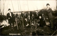 Constantine Michigan MI Men with fish c1910s Real Photo Vintage Postcard bhn picture