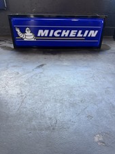 Beautiful Michelin tire advertisement lighted sign. Blue 36in length 12in height picture