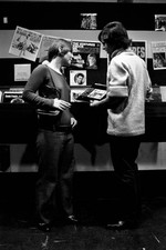 Two British young people watching a long playing record by Bobby B- Old Photo picture