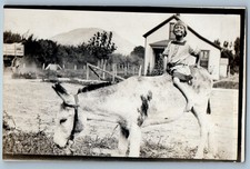 c1910's Child Girl Ride On Mule House Scene RPPC Photo Unposted Antique Postcard picture