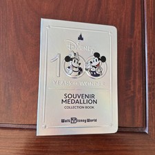 Walt Disney World 100 Year Anniversary Binder Coin Lot with 17 Coins Medallions picture