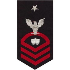 Navy E8 MALE Rating Badge: Mineman  - seaworthy red on blue picture