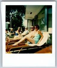 Vtg Polaroid Snapshot Photo People Sunbathing Lounge Chairs Patio Resort picture