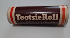 Vintage Tootsie Roll  Coin Bank - Metal/Cardboard -  7” H X 2.5