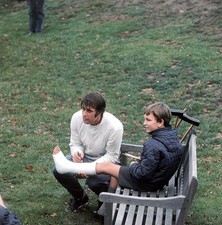 England's Geoff Hurst autographs a young fan's plaster cast 1970 Old Photo picture