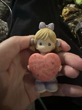 Precious Moments Resin Figurine, Girl Holding Heart - Thank You, by Enesco picture
