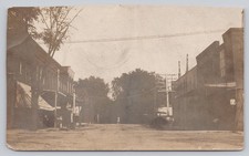 1903 Trenton Missouri Main Street RPPC Postcard - Dirt Road & Buildings picture