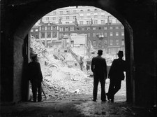 Construction workers continue their task of demolishing the - 1936 Old Photo 1 picture