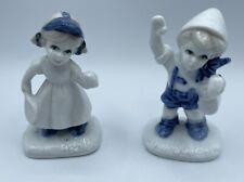 Vintage Pair Of Blue and White Painted Dutch Boy and Girl Figurines - Sports picture