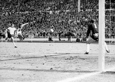 England's Geoff Hurst cracks a shot past German goalkeeper Han- 1966 Old Photo picture