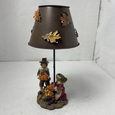 Thanksgiving-Themed Votive Candle Holder Featuring pilgrim Figures & Metal Shade picture