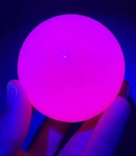 Pink Mangano Calcite Sphere UV Reactive Fluorescent Glow Polished Mineral picture