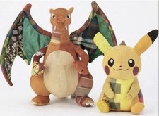 Pokemon Center Exclusive Pikachu & Charizard Sean Wotherspoon Plush set picture