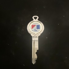 Vintage American Motors, White Gold Logo Enamel, RA – 4 Crest Key 1975 picture
