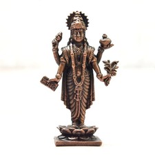 Antique copper Dhanvantri idol Hindu god of medicine incarnation of Lord vishnu picture