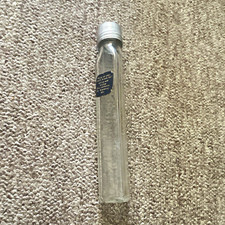 Owens Embossed Clear Glass Medicine Bottle 
