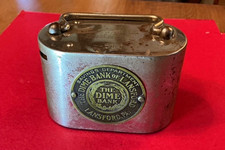 ANTIQUE STEEL COIN BANK  